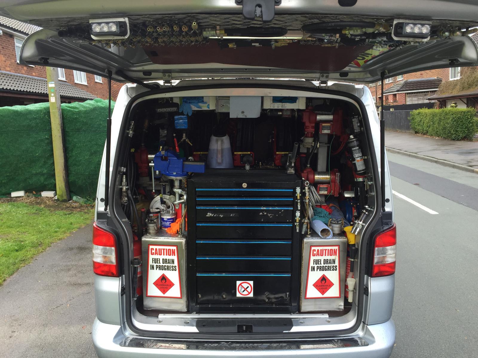 Van boot open showing the mobile mechanic equipment setup